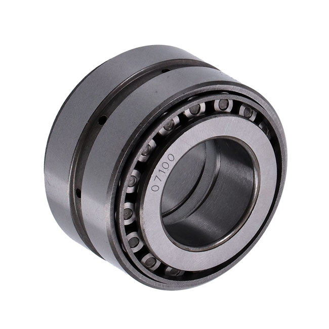 Sprocket shaft bearing assembly