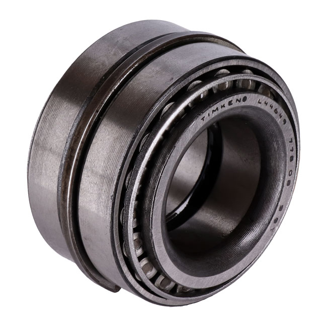 Sprocket shaft bearing assembly